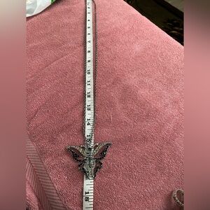 10 necklaces, 2 bracelets and a set of earrings